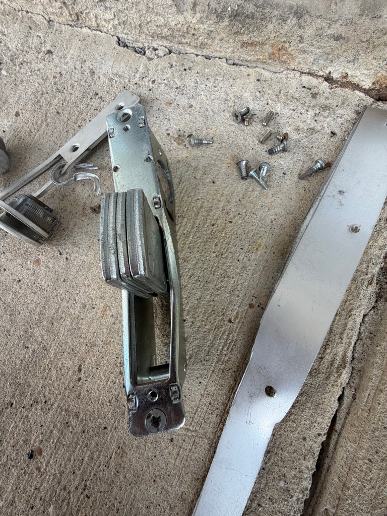 Storefront Hookbolt Lock Mechanism