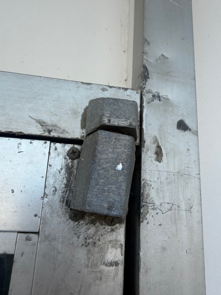 DAMAGED DOOR PIVOT