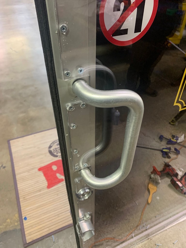 DOOR SHIELD HARDWARE DETAIL